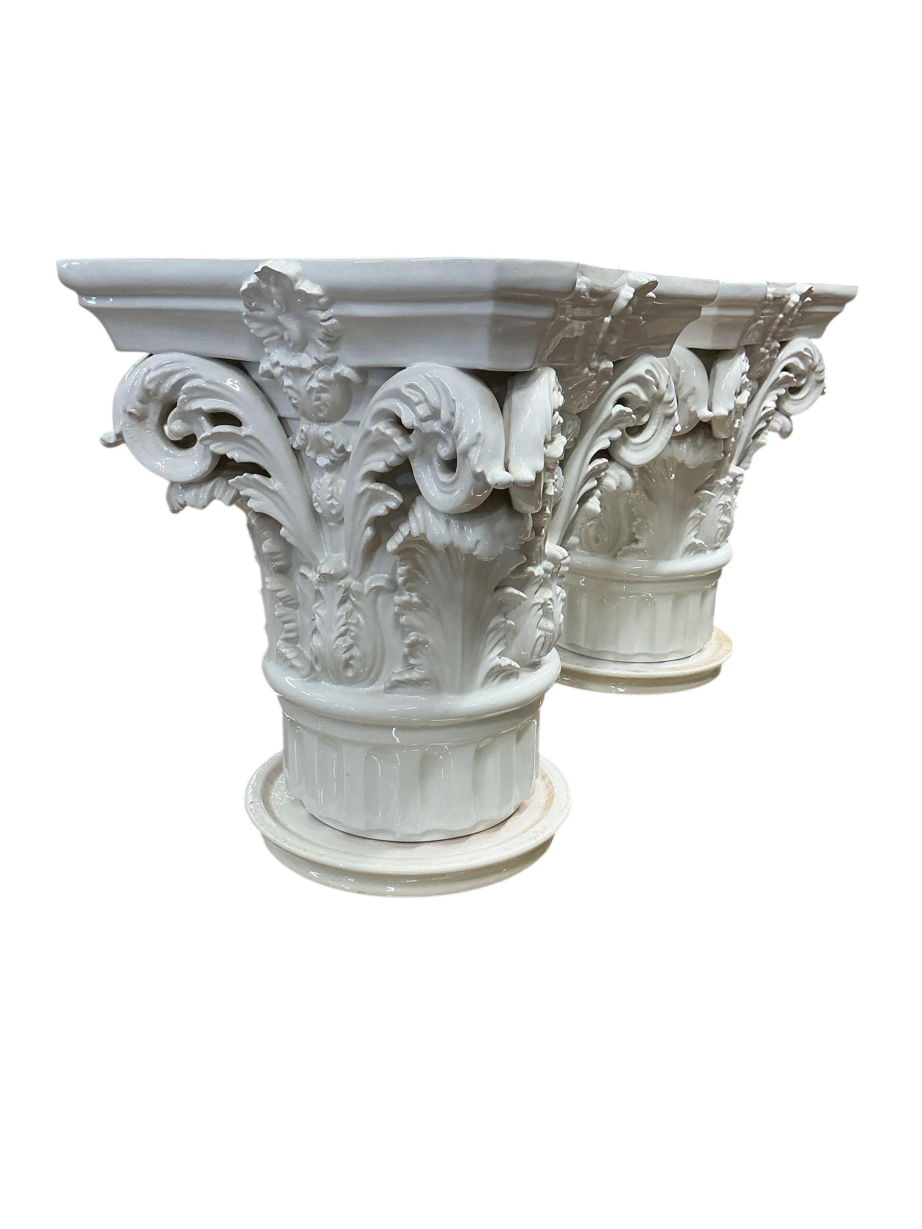 A pair of Italian VBC Ceramica Corinthian column capital pedestals, height 47cm